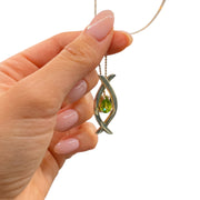 Silver pendant with peridot