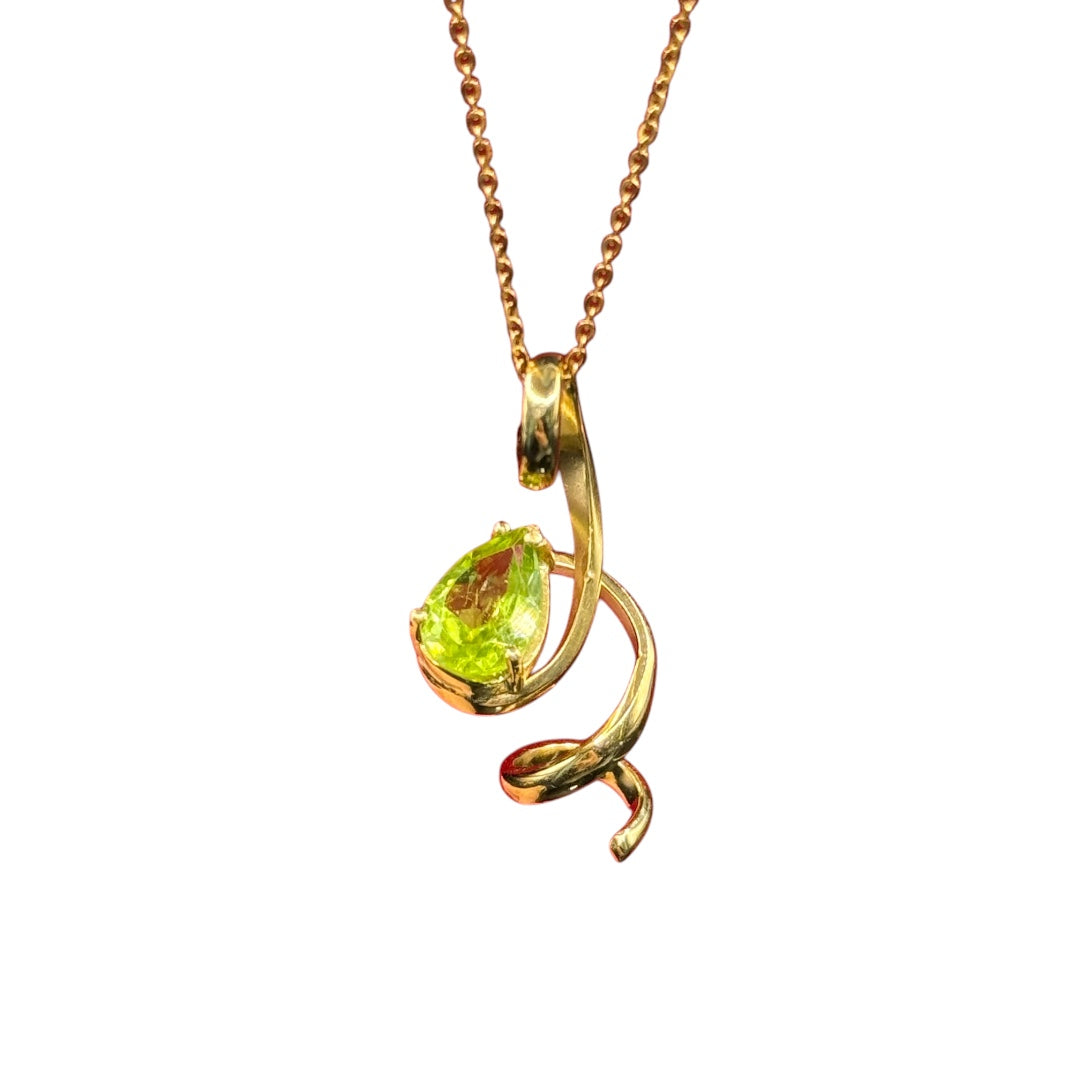 gold pendant with peridot