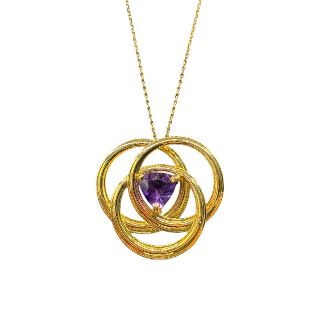 gold pendant with amethyst stone