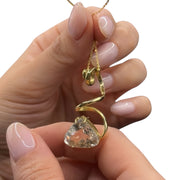 gold pendant with topaz