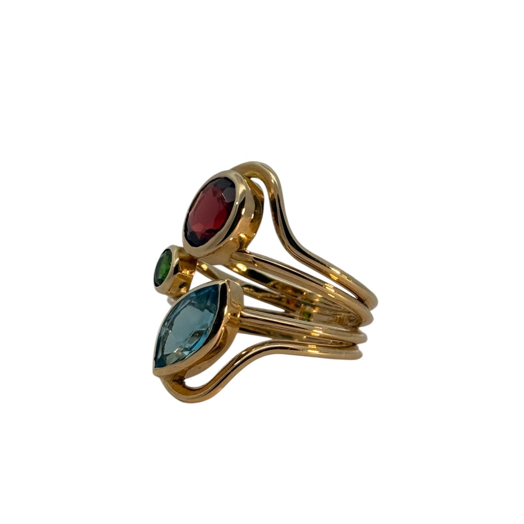 gold ring with topaz,period,garnet
