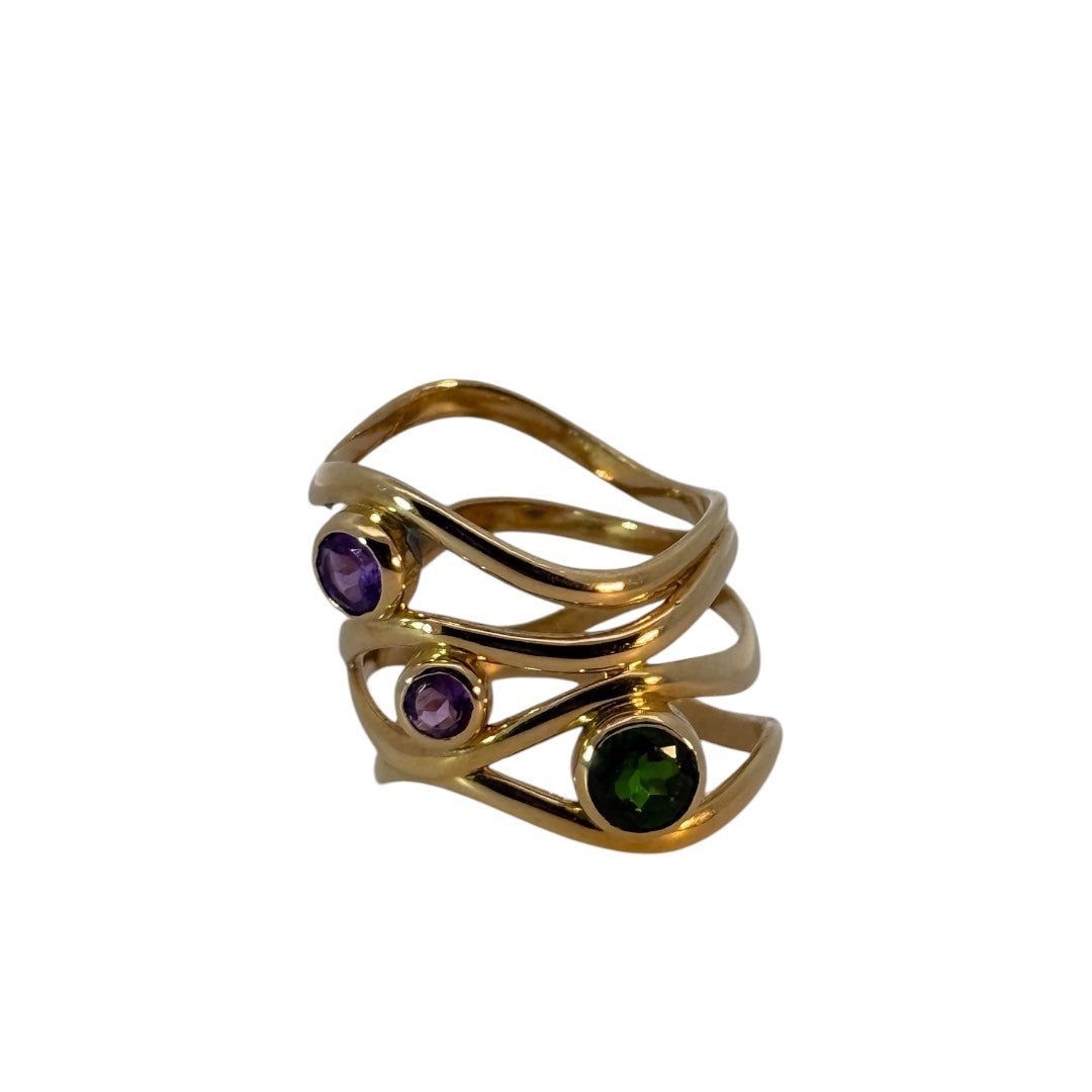 gold ring with amethyst and period