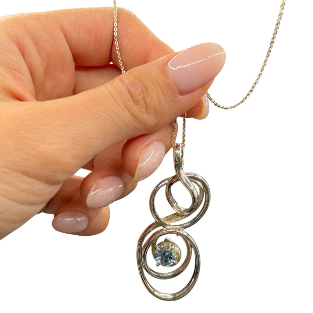 Silver pendant with topaz